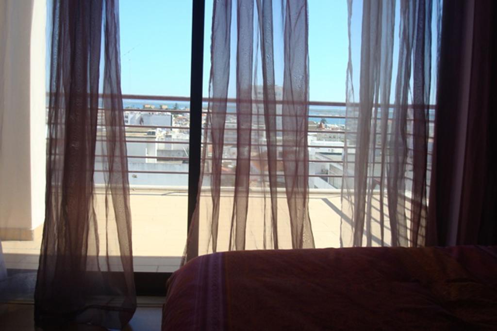 Bellavita City Faro Bagian luar foto